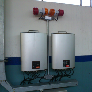 Control Units, DC1: Mounted on wall with alarms installed above